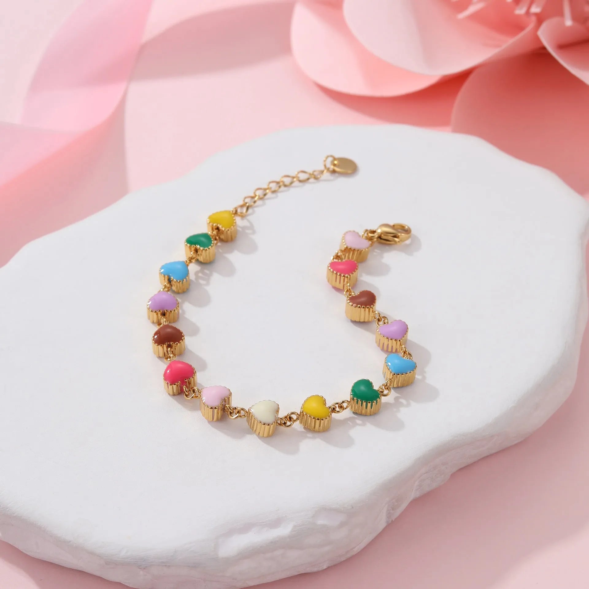 Women's titanium steel bracelet with love heart pendant in gold or steel electroplated finish