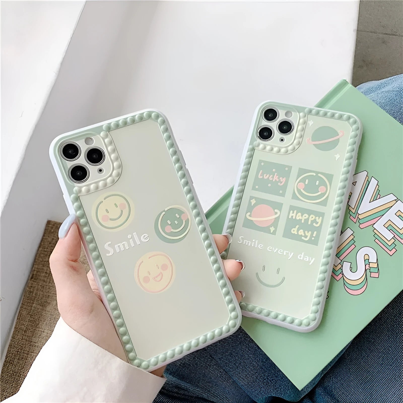 Green geometric pattern TPU iPhone case with polka dot frame and smiley faces, shown from the back.