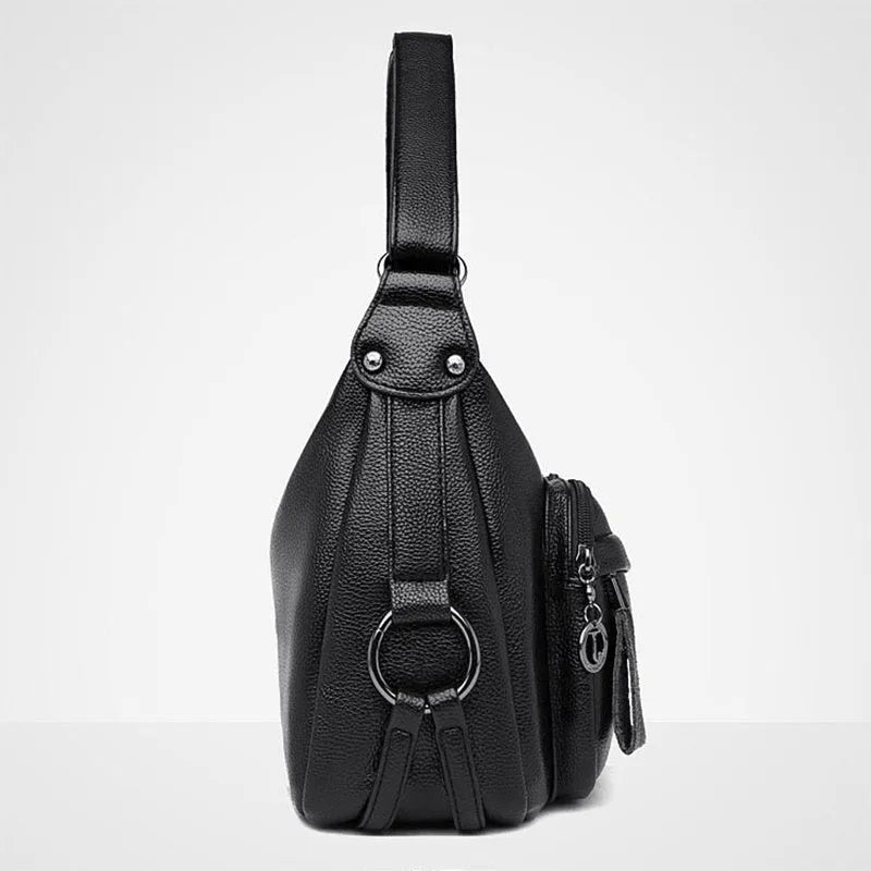 Large black women's shoulder bag with multiple internal organisation pockets and crossbody strap