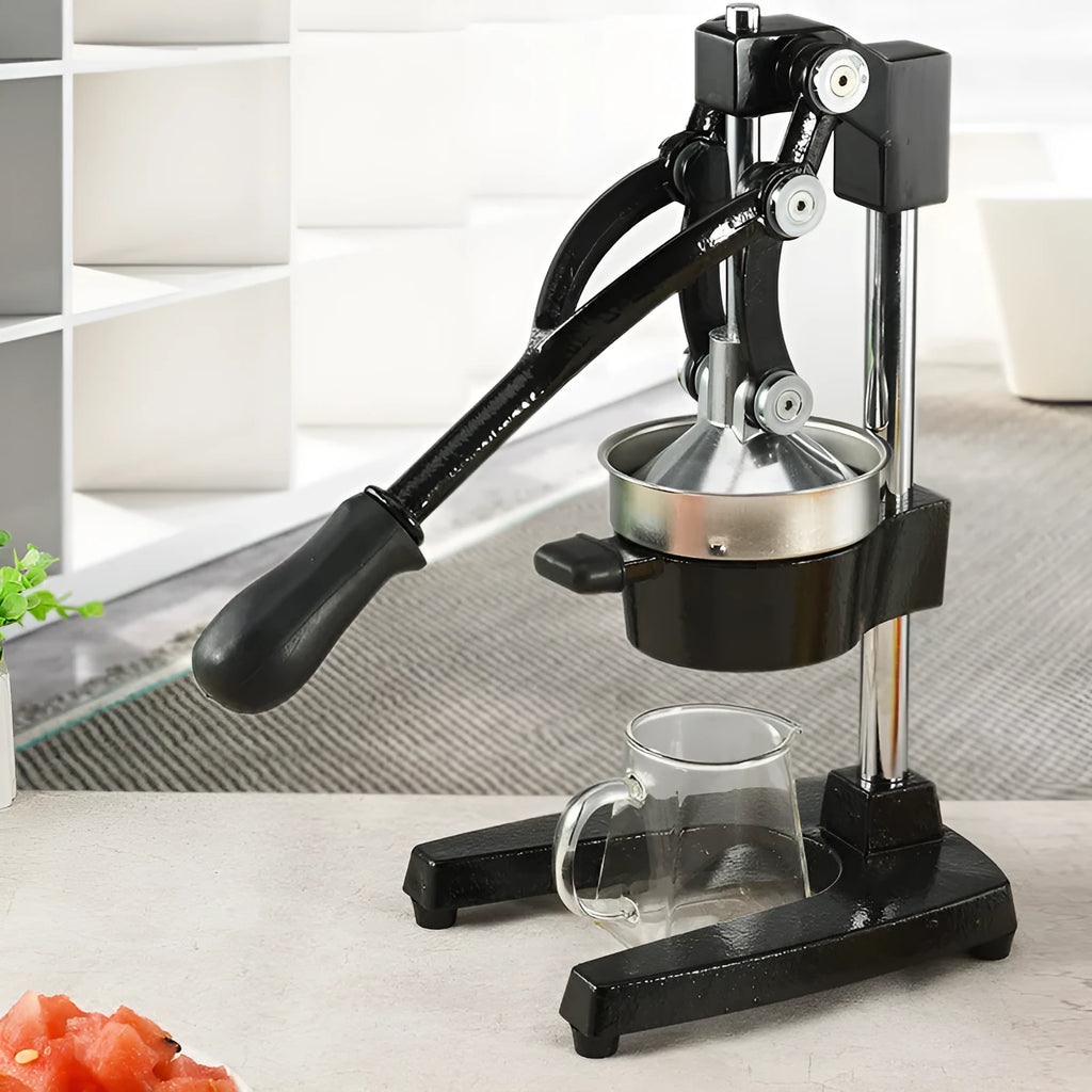 Black or white manual cast iron juicer with stainless steel funnel, 40cm tall.