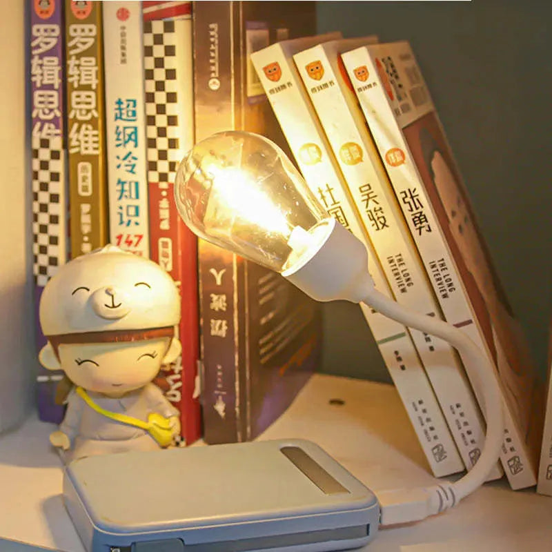 Folding USB rechargeable night light with tungsten filament bulb design in S14 format