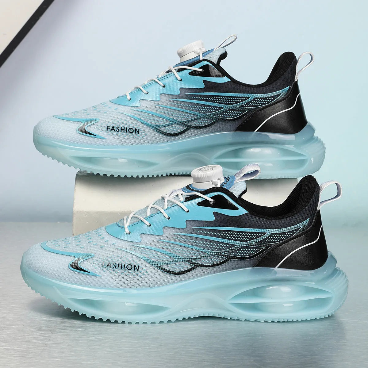 Pair of breathable casual running shoes with mesh upper and rubber sole in a solid colour.