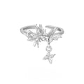 Silver adjustable butterfly ring with electroplated finish in white gold or 18K gold colour.