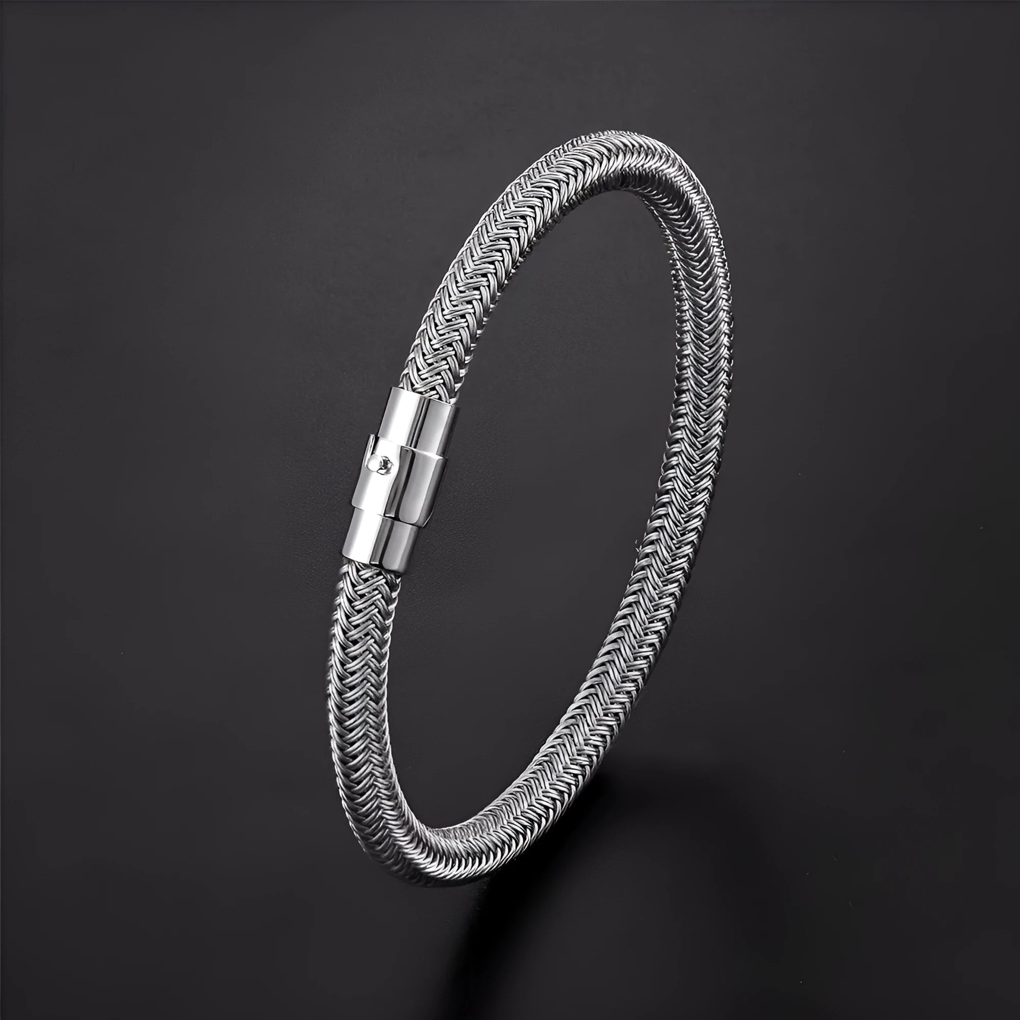 Titanium steel geometric wire bracelet with magnet clasp shown in unisex boyfriend style
