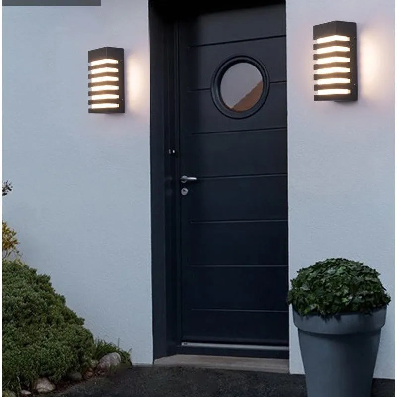 Minimalist aluminium outdoor wall lamp with IP55 waterproof rating and LED light source.