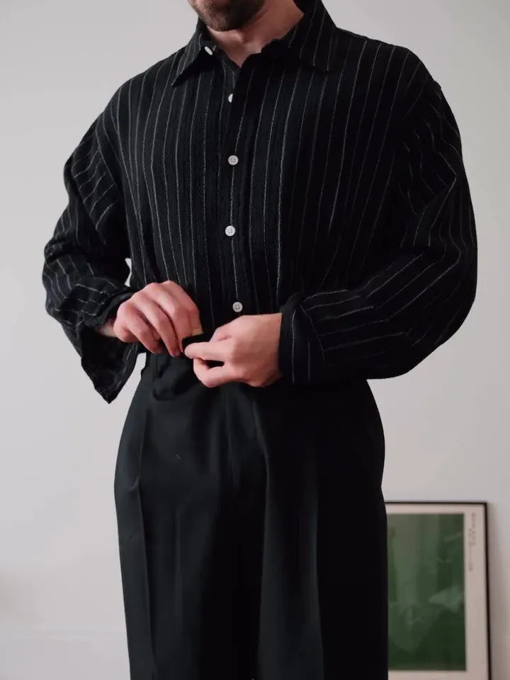Black and white pinstriped men's long sleeve button-down shirt with a regular fit.