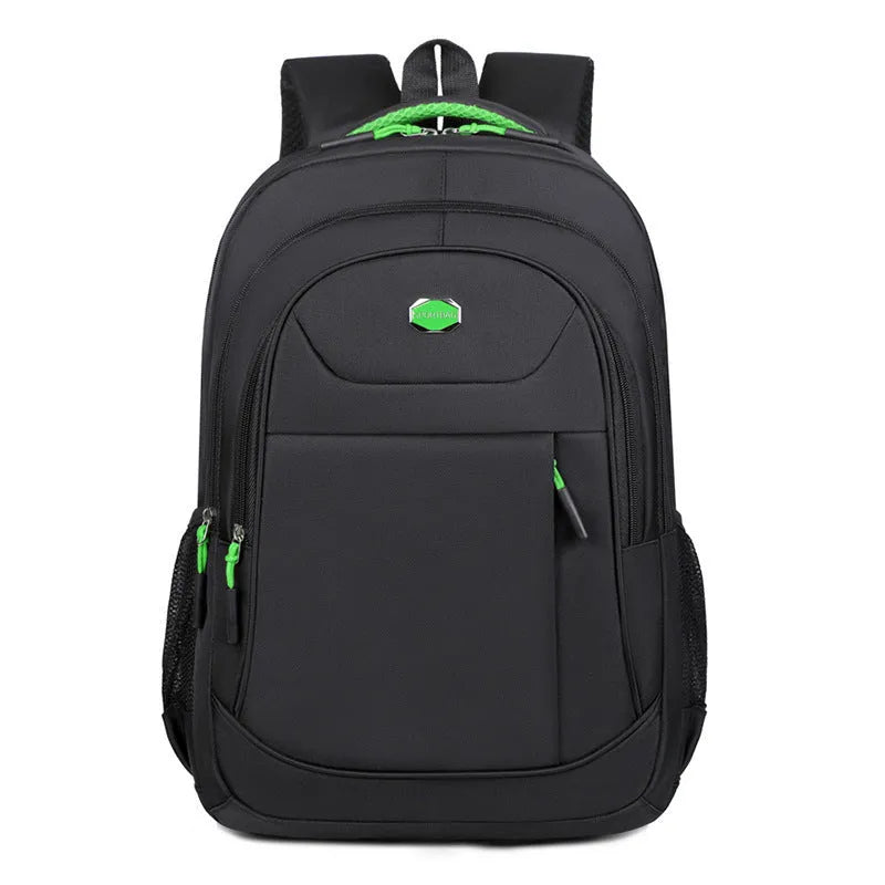 Oxford cloth backpack in solid colour with curved shoulder straps, shown with multi-layer compartments open