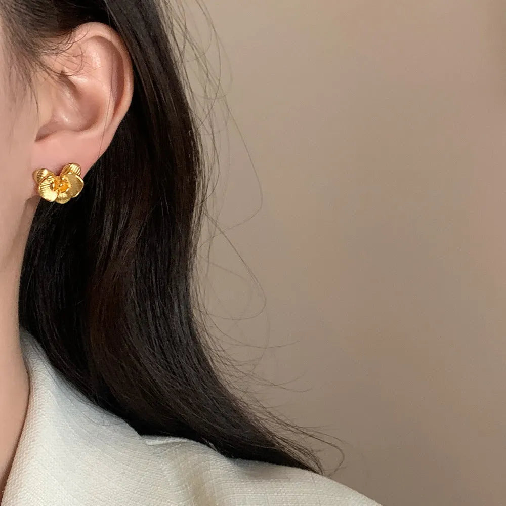 Copper flower earrings with electroplated gold or silver finish and retro petal design