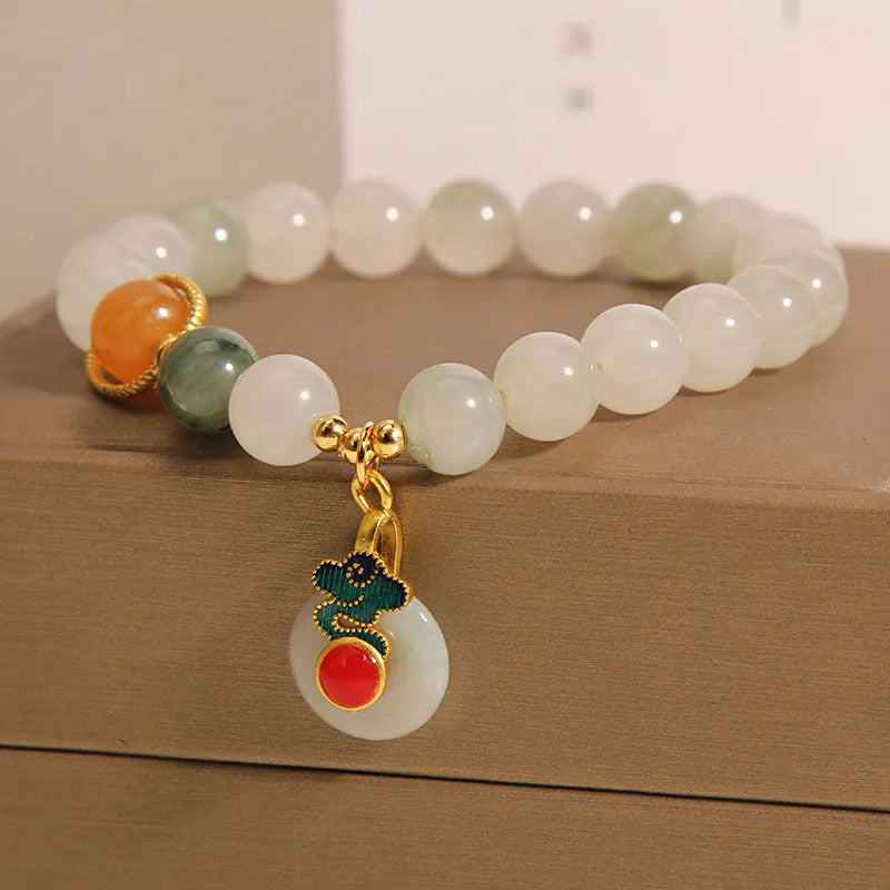 Ice jade women's bracelet with pearl accents and Xiangyun peace jade buckle design