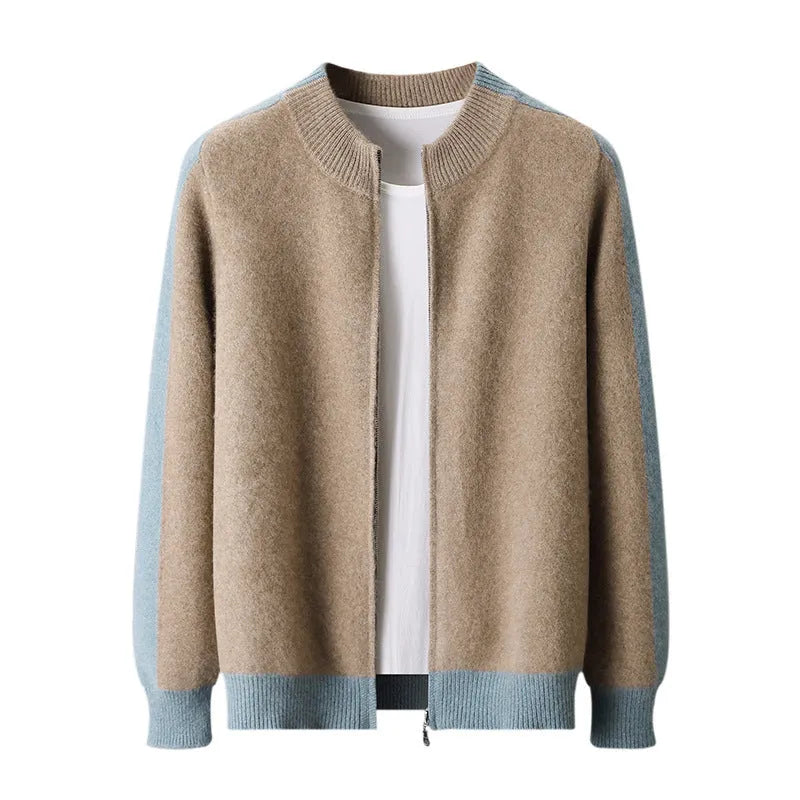 Man wearing a dark blue half turtleneck zip-up wool cardigan sweater in a loose fit.