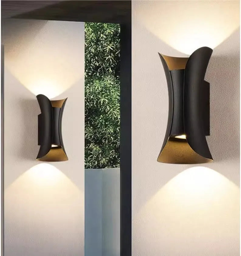 An elongated aluminium outdoor wall lamp mounted on a wall, suitable for stairs and corridors.