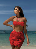 White women's bikini with 3D flower details and split design on a mannequin.