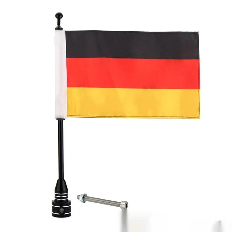 Black and silver motorcycle side box flagpole for mounting on luggage rack or bumper.