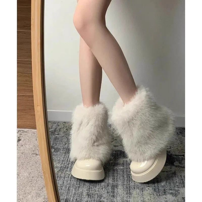 Women's black waterproof snow boots with fleece lining and platform rubber sole
