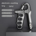 Adjustable electronic counter spring grip hand strengthener in grey, orange, or red.