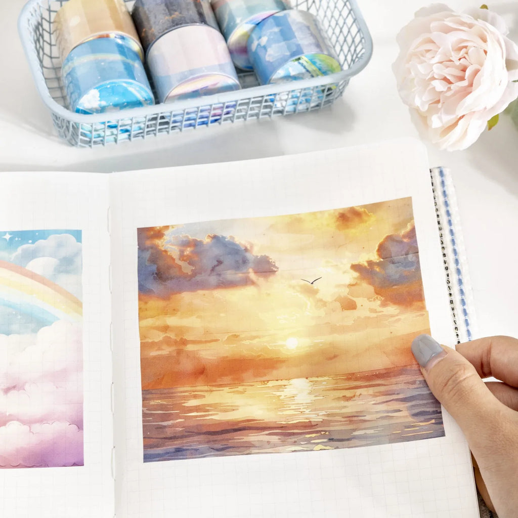 Roll of Japanese paper decorative washi tape in sky-themed colours, 30mm wide.