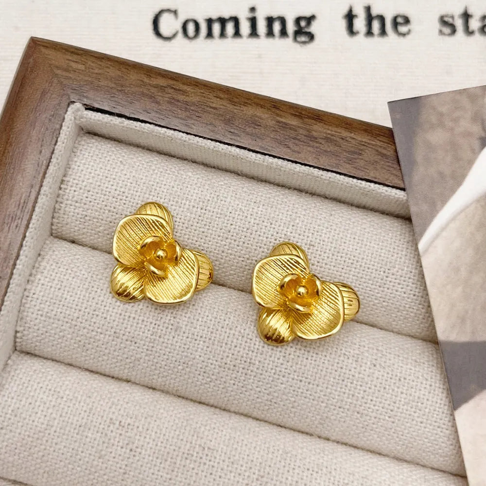 Copper flower earrings with electroplated gold or silver finish and retro petal design