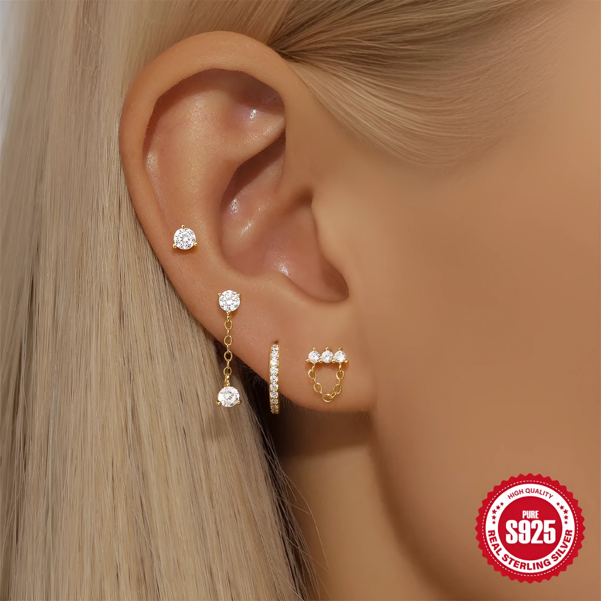 S925 sterling silver earrings with geometric clover petal design and gold electroplating