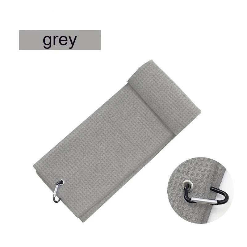 Waffle weave golf ball cleaning cloth towel showing textured surface in selected colour