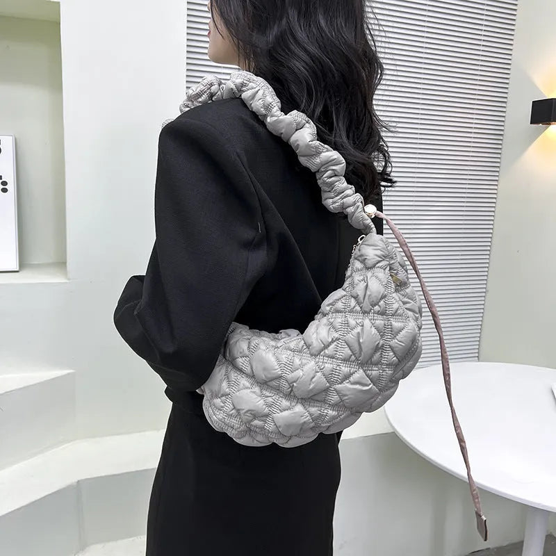 Women's casual nylon underarm shoulder bag in beige with adjustable strap, showing 35cm width