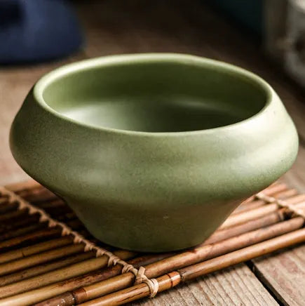 Tall porcelain Japanese soup bowl with stone conch shape and underglaze retro pattern.