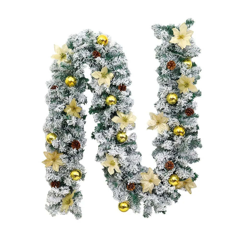 PVC Christmas rattan garland with flocked finish in golden colour option draped over mantelpiece