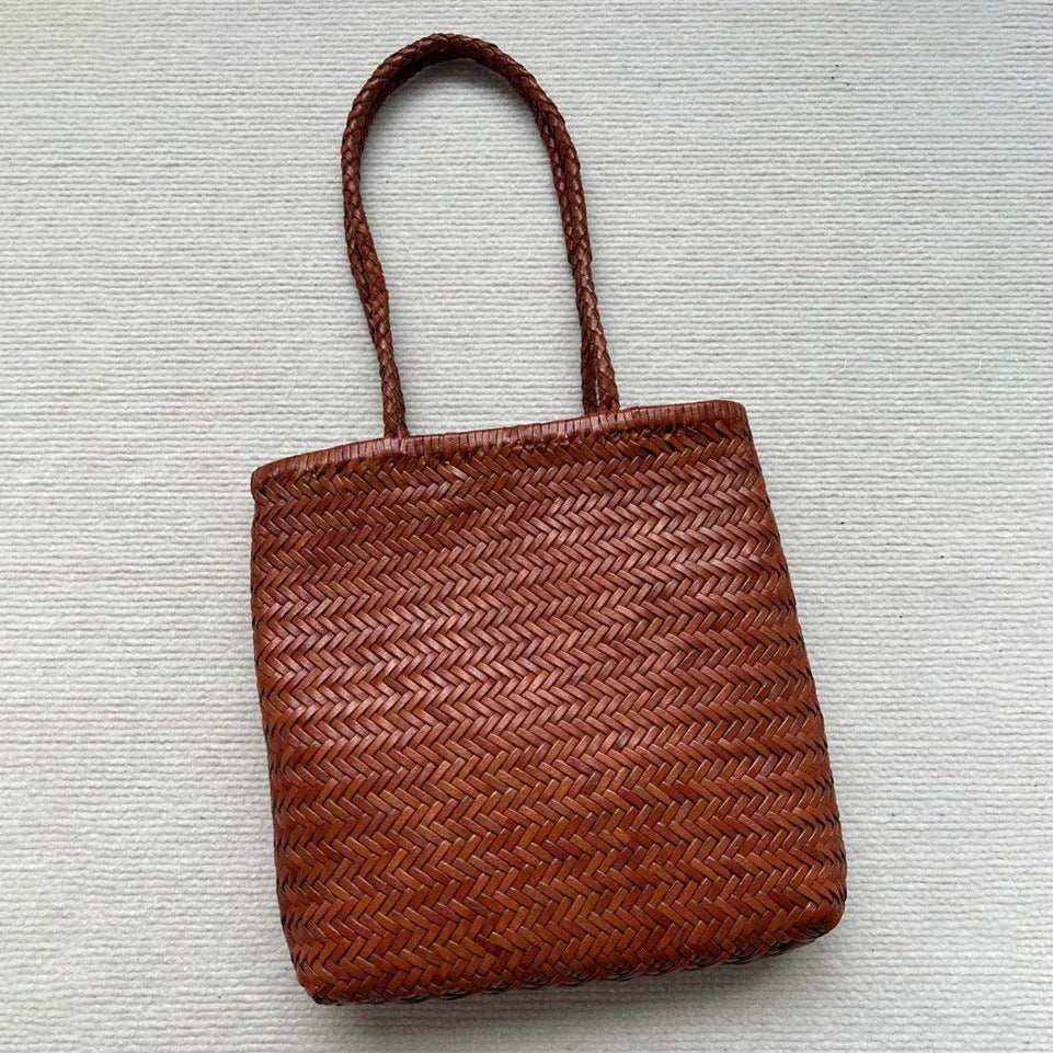 Brown handmade cowhide leather woven shoulder bag with three-dimensional pocket