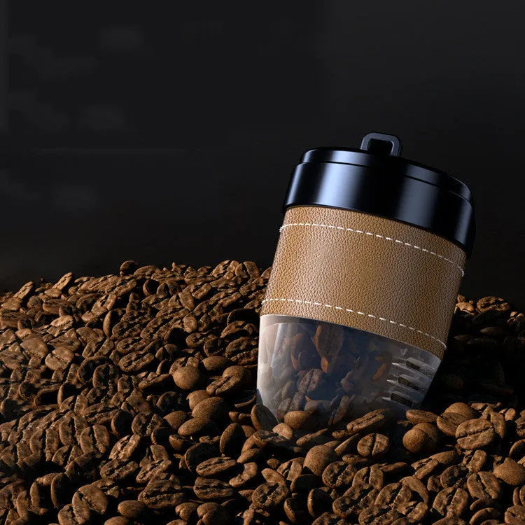 Coffee cup shaped plastic car air freshener in choice of five colours for vehicle odour removal.