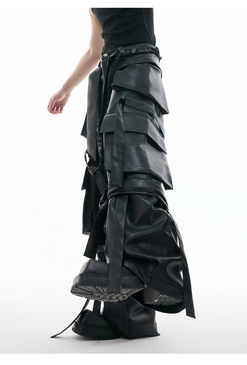 Men's black loose-fit leather trousers with quilted stitching and multiple pockets