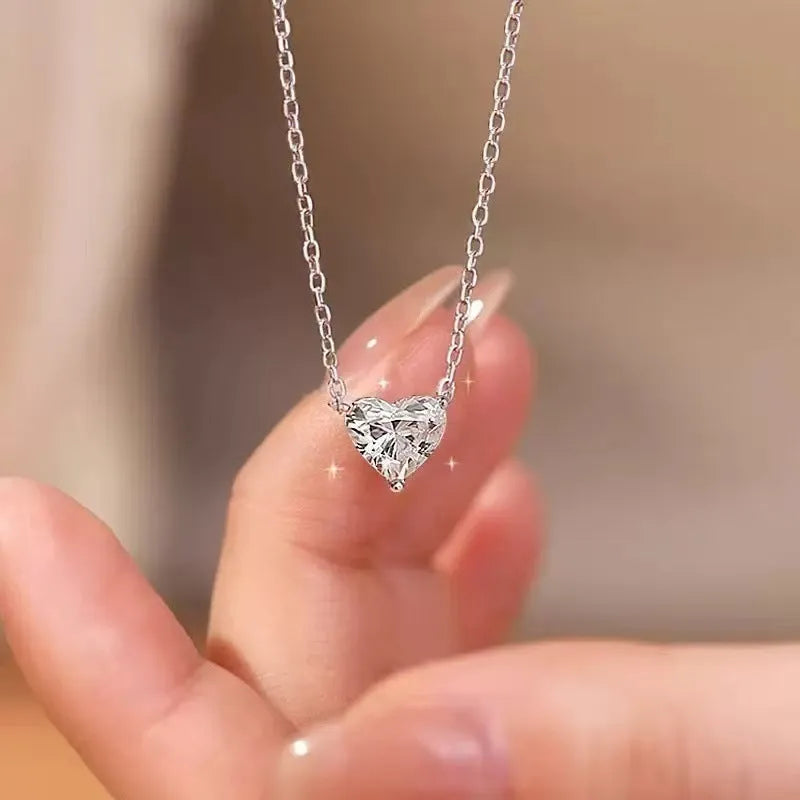 Silver-coloured women's heart necklace on a simple chain.