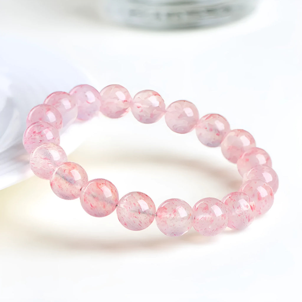 Strawberry quartz crystal ball bracelet with white water colour and 10-10.8mm geometric beads