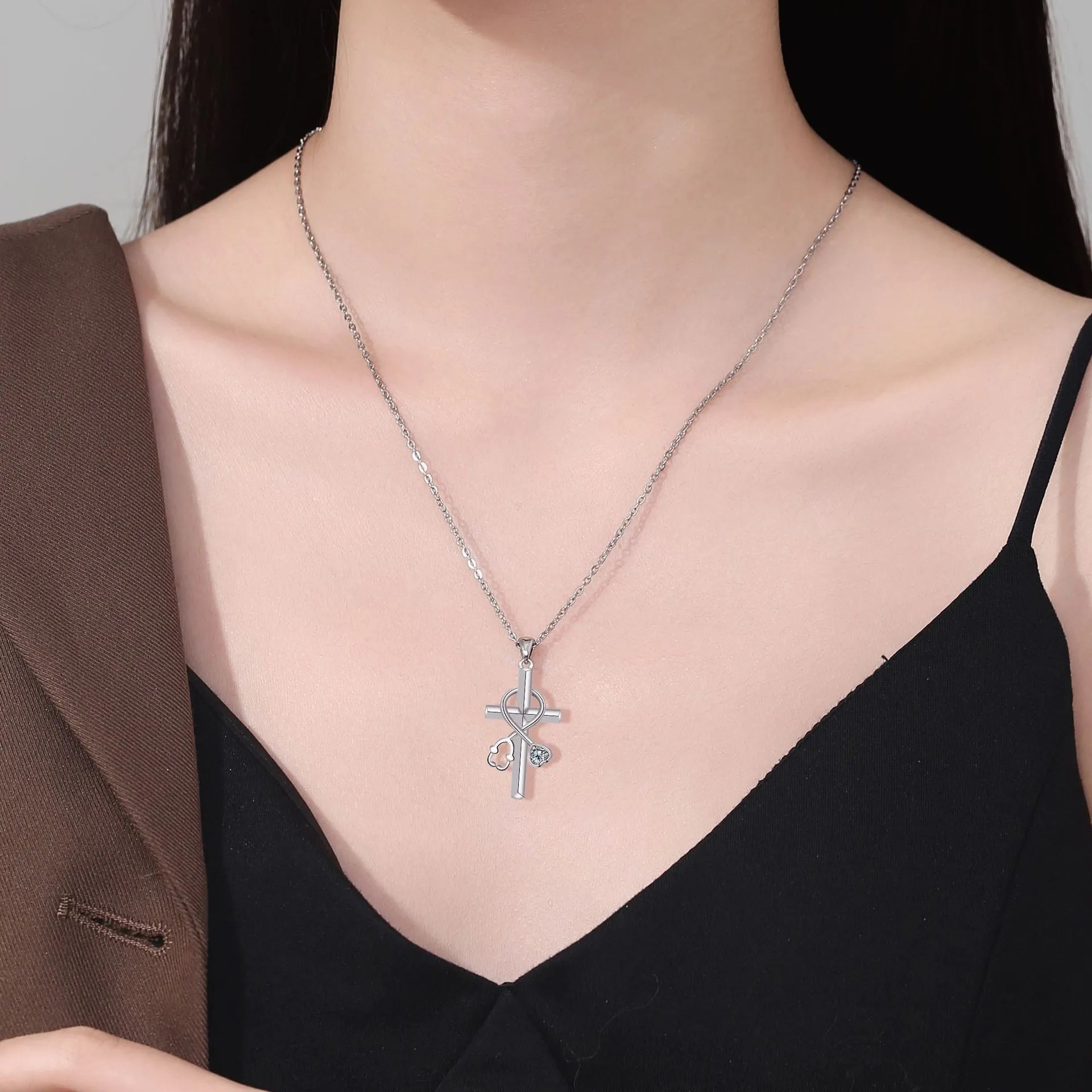 Close-up of a copper stethoscope pendant necklace on a cross-link chain for women.