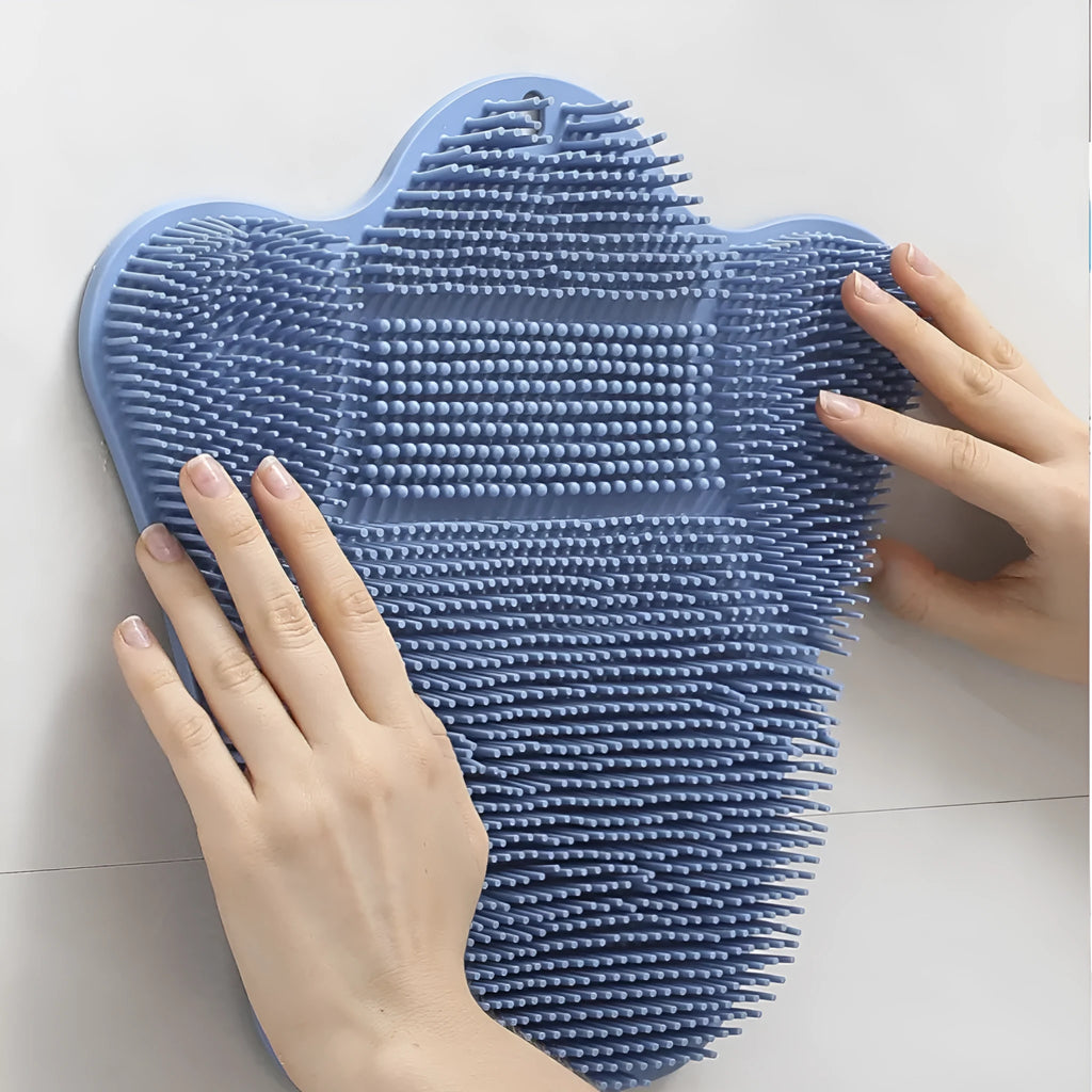 Silicone bath massage cushion mat measuring 31x32cm in blue colour with textured surface for foot scrubbing