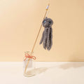 Octopus wand cat toy with moving eyes and flexible wand for indoor kitten play