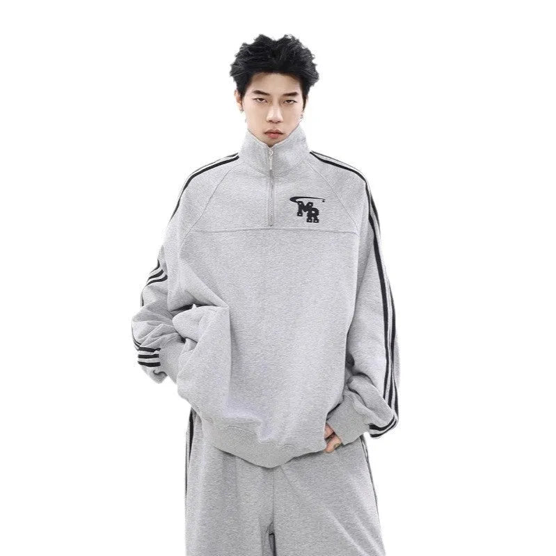 Black stand collar polyester couple hoodie with long sleeves in Hong Kong retro high street style