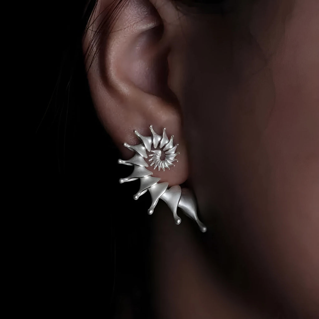 Matte finish alloy conch stud earrings with three-dimensional design and irregular shape