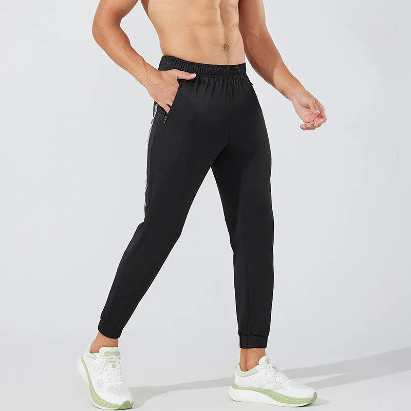 Men's black running trousers with mid waist design for athletic exercise