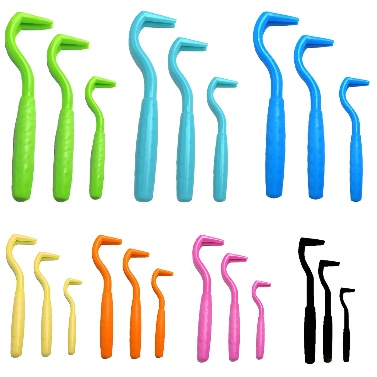 Three coloured plastic tick removal hooks for dogs on a plain background.