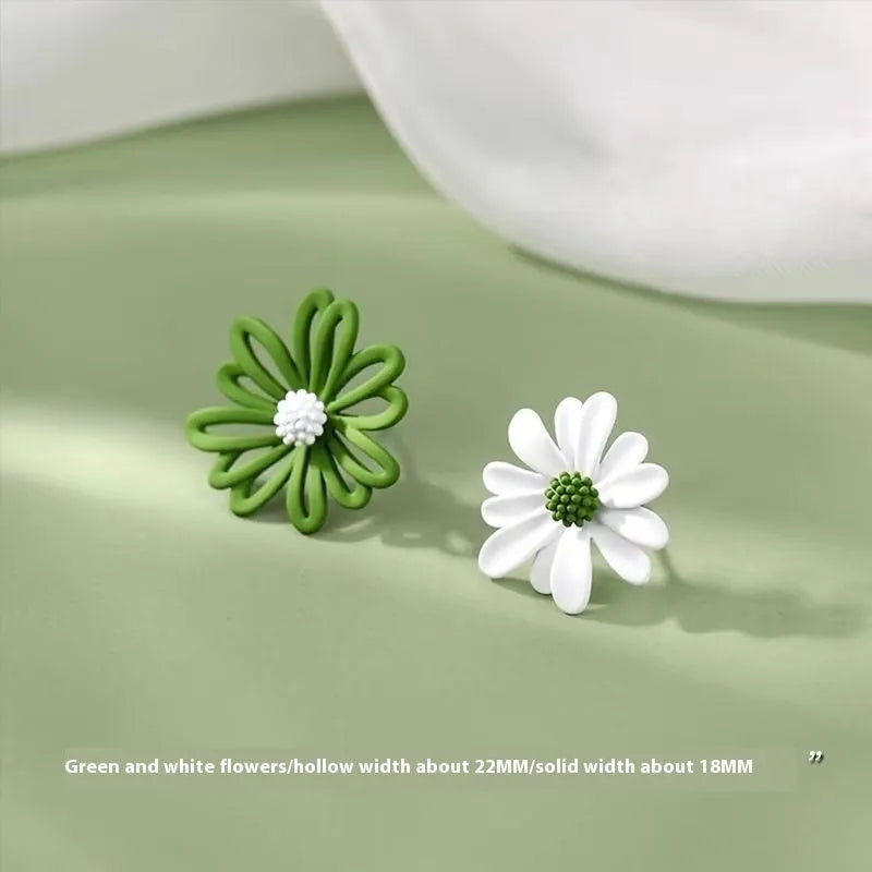 Alloy cartoon flower stud earrings in blue and orange, white and green, or yellow and white two-tone colours.