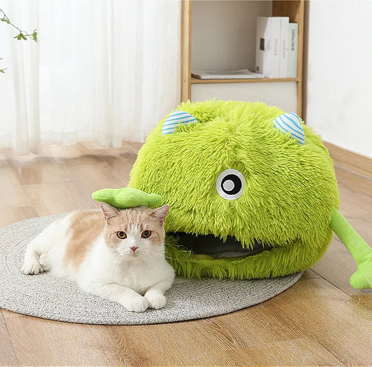 Round fluffy cat bed for indoor cats with self-warming feature and non-slip base