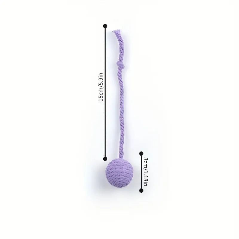 Colourful cat toy ball with rope attachment and internal bell for interactive kitten play