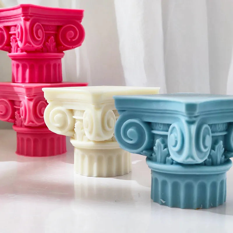A flexible silicone mould in the shape of an irregular Roman pillar for making candles, chocolate, and crafts.