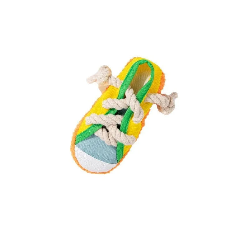 Plastic dog chew toy with sound squeaker in bendable slipper design for dental care