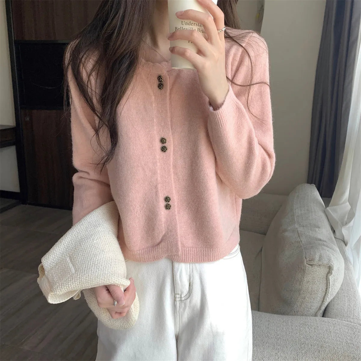 Women's acrylic fibre cardigan sweater in milky white colour with long sleeves and free size fit