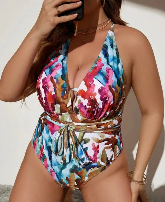 Women's solid colour one-piece halter swimsuit in blue or purple for swimming sports