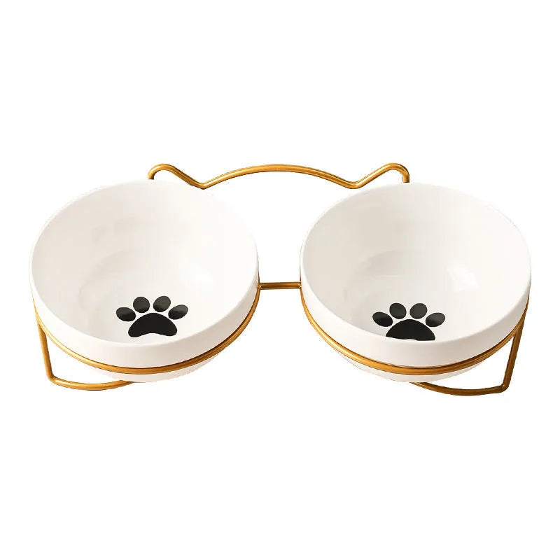 White ceramic cat bowl with cat paw design in black iron frame