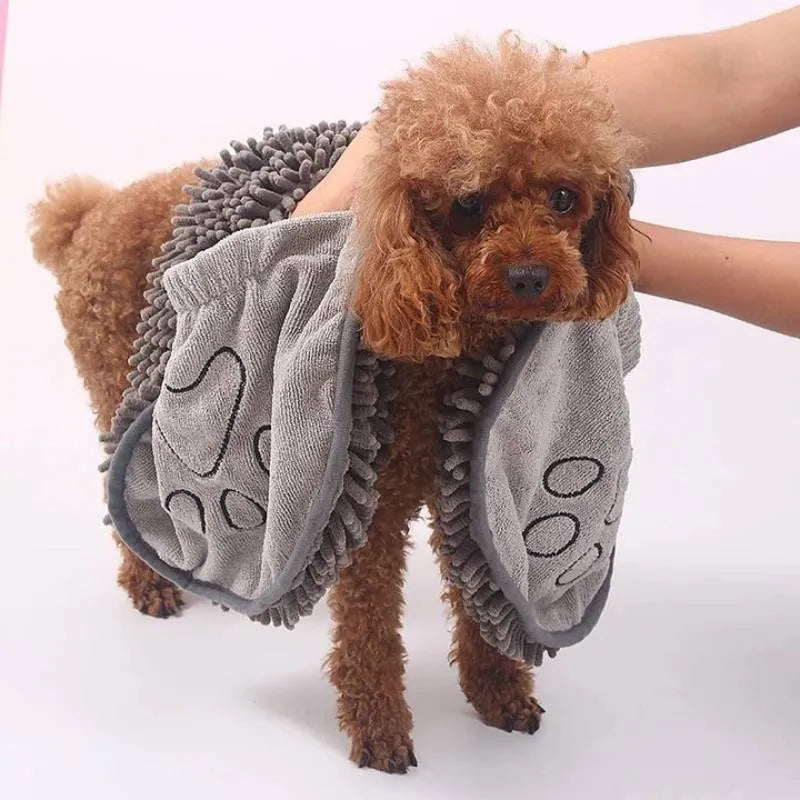 Blue pet bath drying towel for dogs and cats, 62 cm long by 23 cm wide.