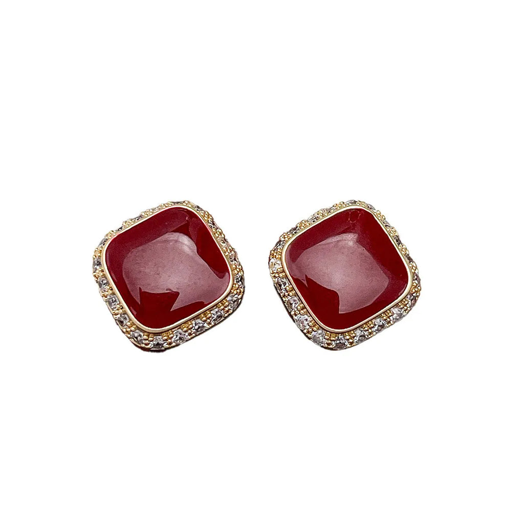 Red square-shaped alloy earrings for women with geometric design and Seiko-treated finish.