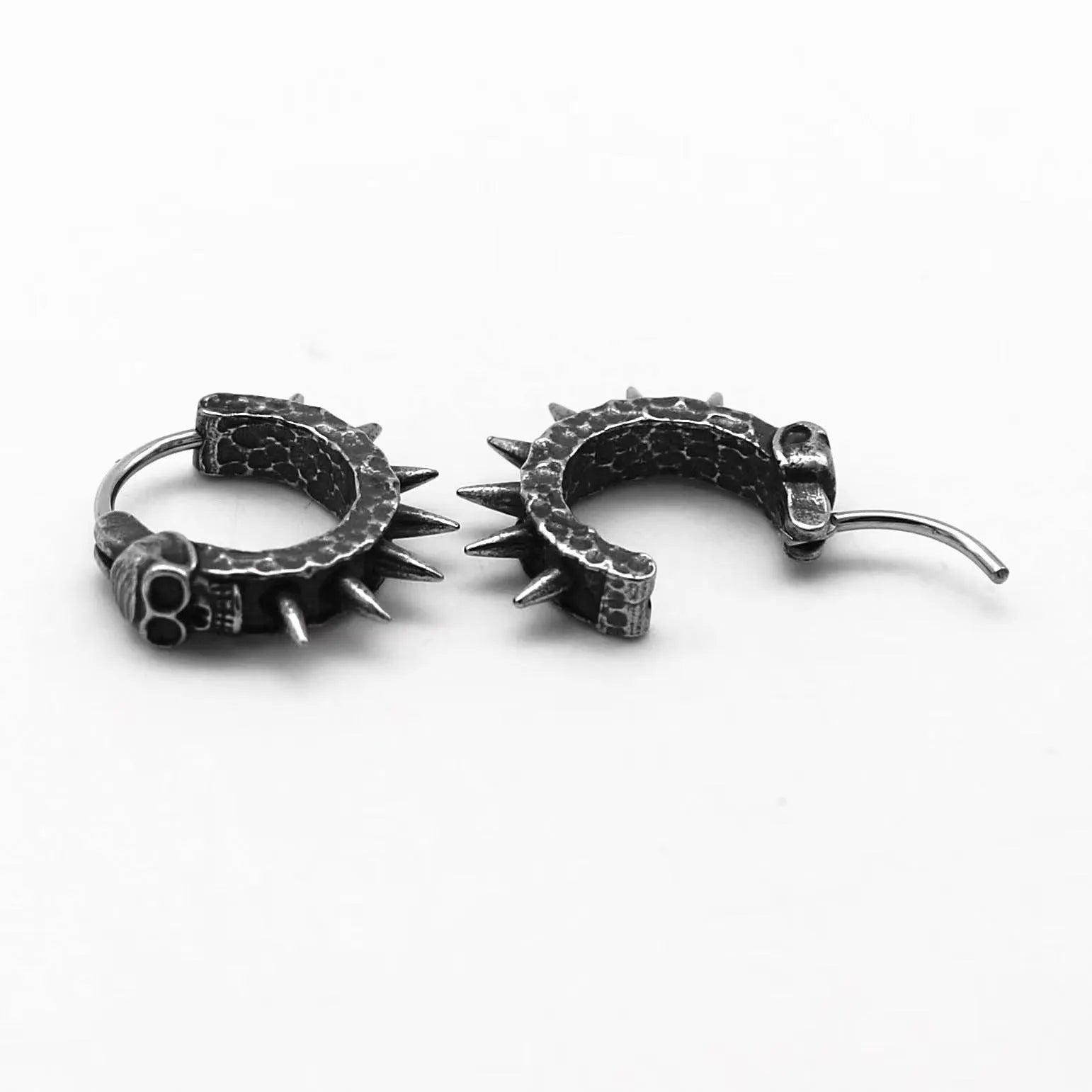 Black geometric punk motorcycle earrings made from alloy with copper plastic details.