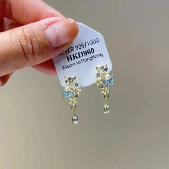 Geometric heart-shaped women's earrings with rhinestones and dangling tassels in silver-toned electroplated alloy